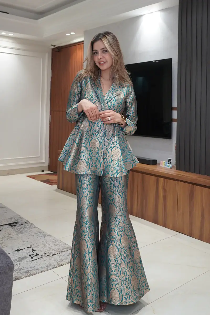 Coral Peplum Top With Flaired Pants