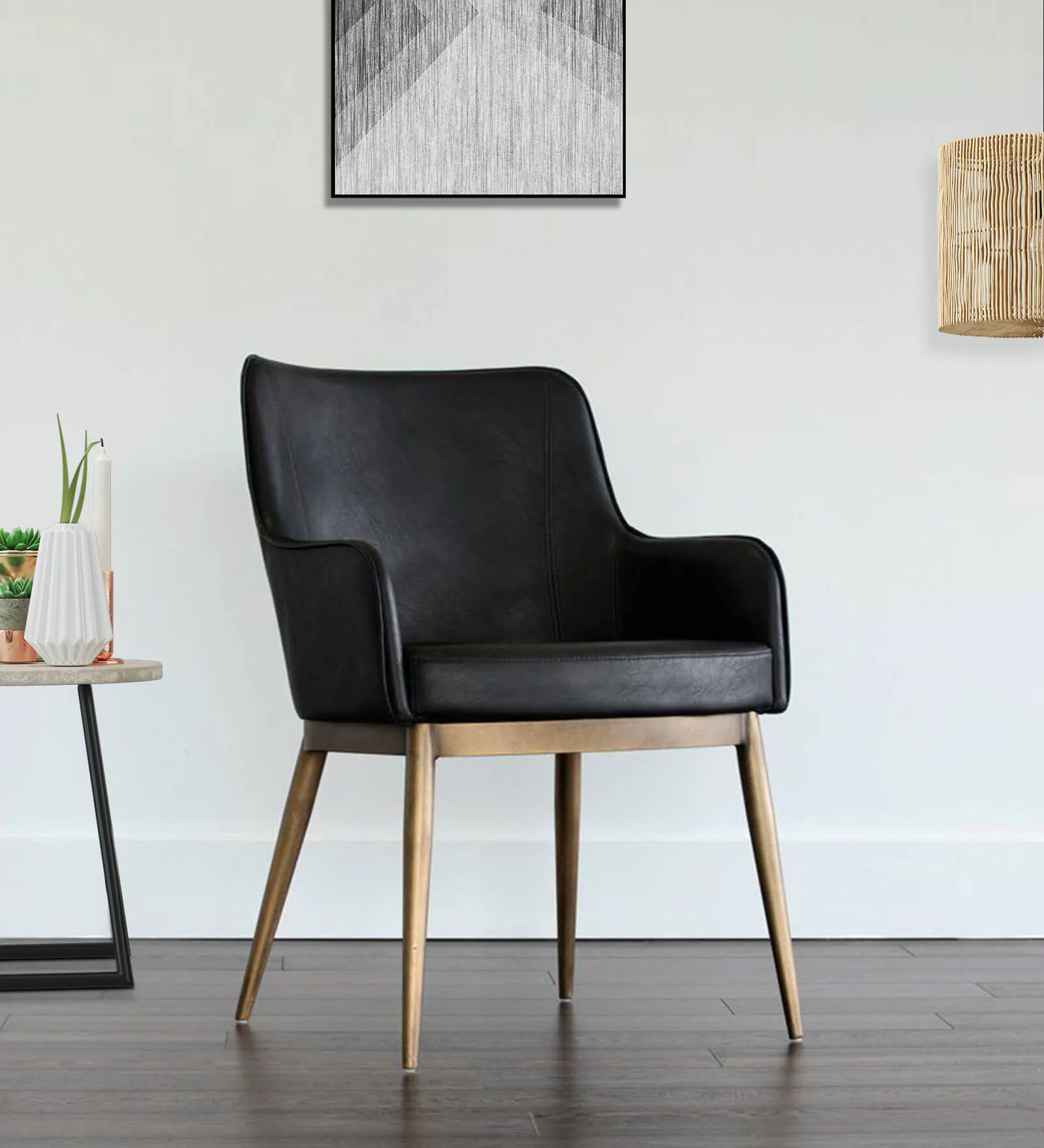 Asko Leatheratte Arm Chair in Black Colour by Kiyan Overseas